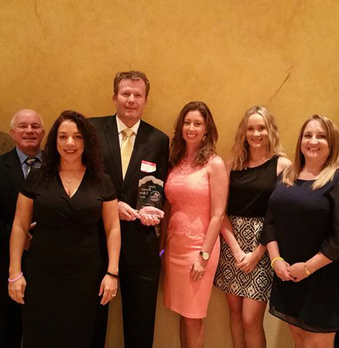 CEO Paul Toomey and Geographic Solutions Team Pictured at the Greater Palm Harbor Chamber of Commerce Awards for Large Business of the Year
