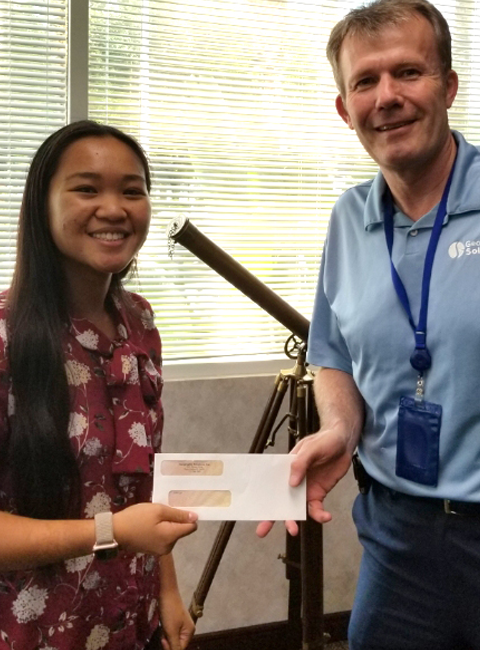 Julie Le with President Paul Toomey holding IT Scholarship Award check