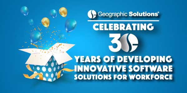 A festive banner celebrating 30 years of Geographic Solutions, featuring a blue background. An illustration of an open gift box is surrounded by blue and gold balloons and confetti. The text on the banner states, 